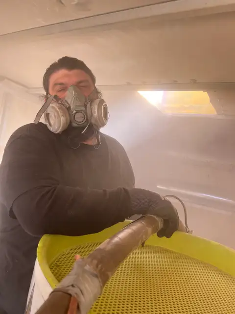 Masked up and grinding through the dust.